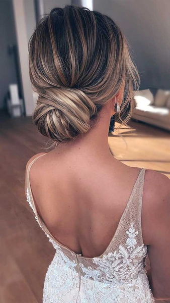 Premium Photo | Beautiful Sleek low bun hair style for bride wedding hair  style event